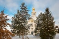 Pine trees in front of the temple are covered in snow. Royalty Free Stock Photo